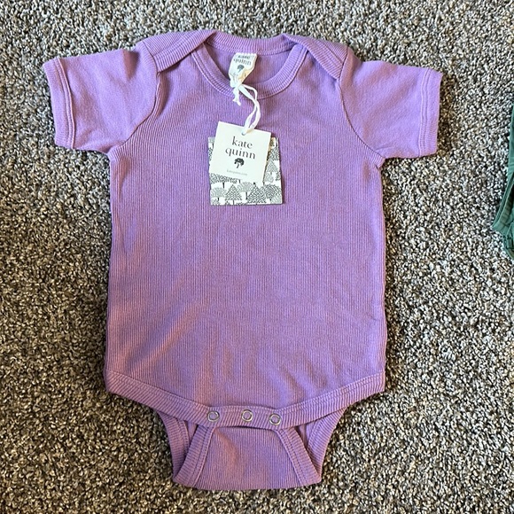 kate quinn One Pieces Nwt Kate Quinn Bodysuit Poshmark